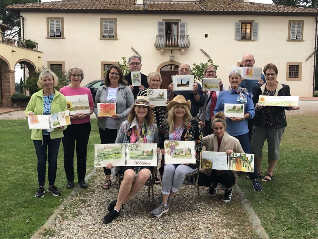 Group of artists painting outdoors together, fostering camaraderie and friendship through the shared experience of painting outdoors with a group
